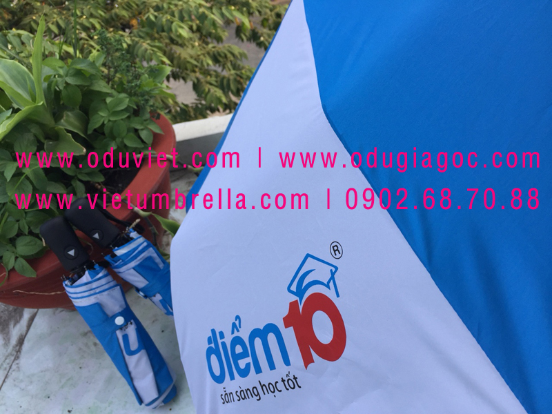 xưởng sản xuất ô dù cầm tay in logo quảng cáo